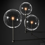 Callene Offset Globe Three-Arm Chandelier 46"